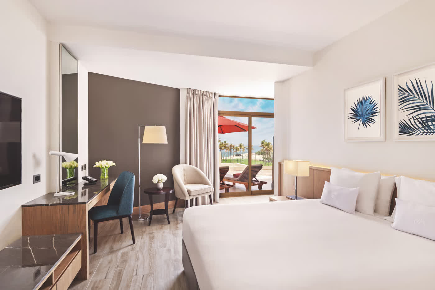 JA Beach Hotel at Jebel Ali Hotel and Resort seen across the gardens and beachfront